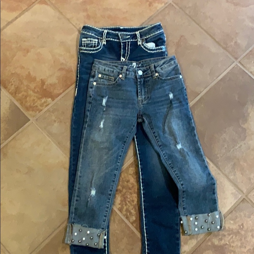 2 pairs of jeans. True religion and 7